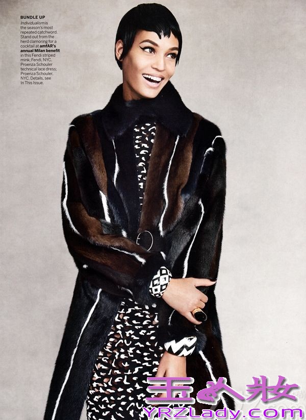 波多黎各短发美女琼·斯莫斯（Joan Smalls）《Vogue》美国版2013年9月刊时尚写真图片，由摄影师Patrick Demarchelier执镜，化妆师Camilla Nickerson造型。封面上，琼·斯莫斯给大家完美呈现了各种时尚奢华大衣，告诉大家这个秋天，外衣才是真正的服装主角。