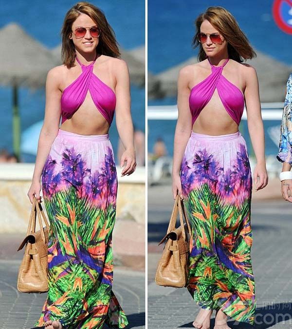 近日英国女星维琪·帕蒂森（Vicky Pattison）现身凉爽海滩，身穿玫红色两件式比基尼，斜搭款式将双峰紧紧包裹，但也掩盖不了致命诱惑，性感尤物一枚！